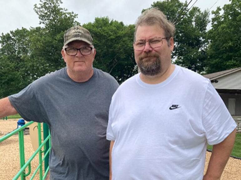 Terry Sparks posing for a picture with his dad, Peter. 