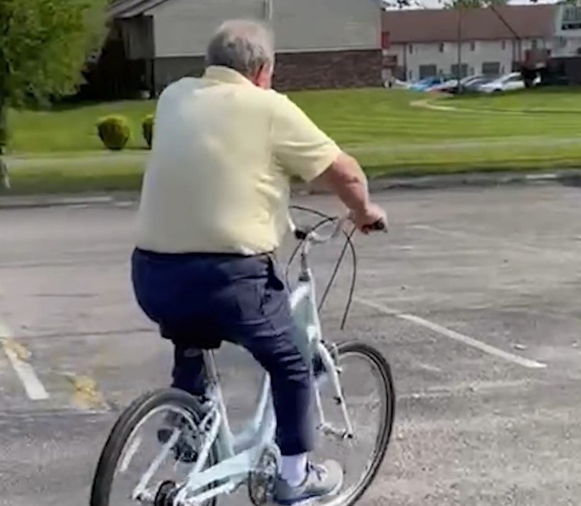 A patient named Tony learning how to balance on a bike again.